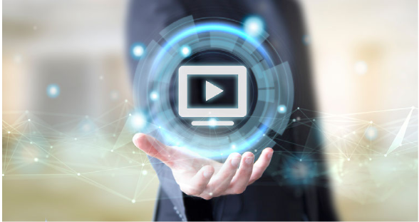 A video play symbol held in an open hand